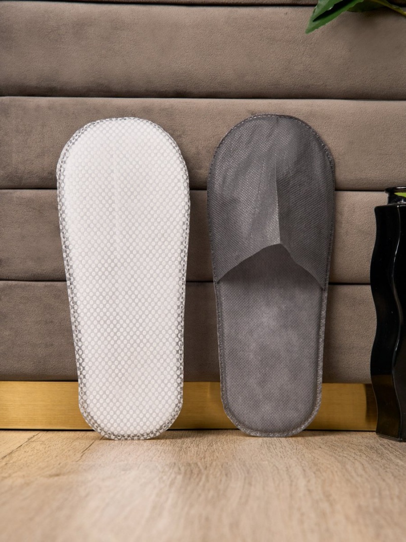 Одноразовые тапочки 