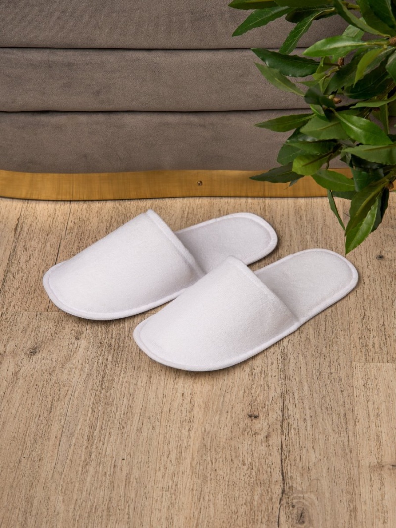 Тапочки одноразовые 