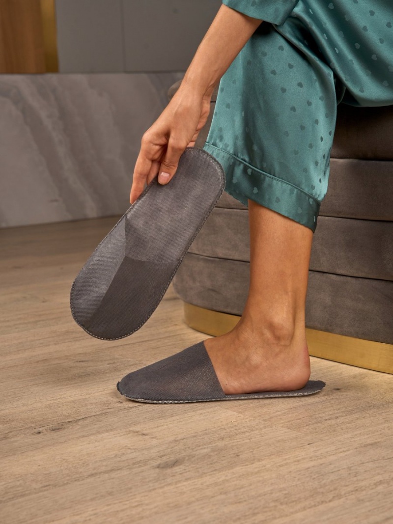 Одноразовые тапочки 