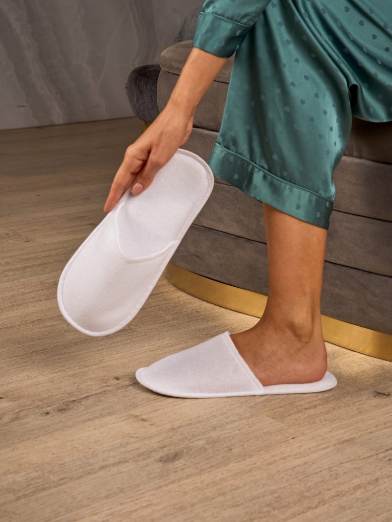 Тапочки одноразовые 