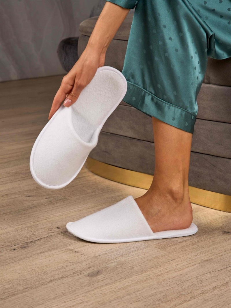 Тапочки одноразовые 